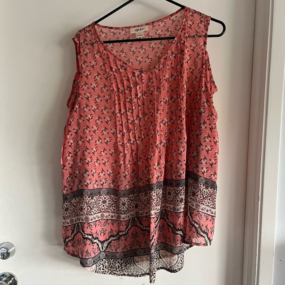 Light pink, short sleeve blouse by style and Co and is a woman’s size large